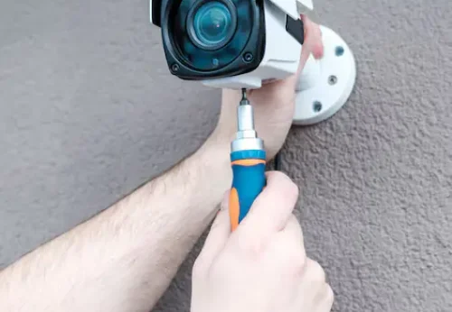 close-up-hands-technician-adjusting-cctv-camera_146377-3769-ezgif.com-avif-to-webp-converter-1